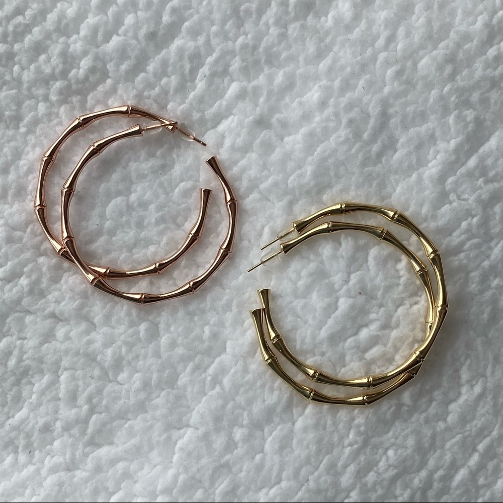 Set of two gold plated earrings.
